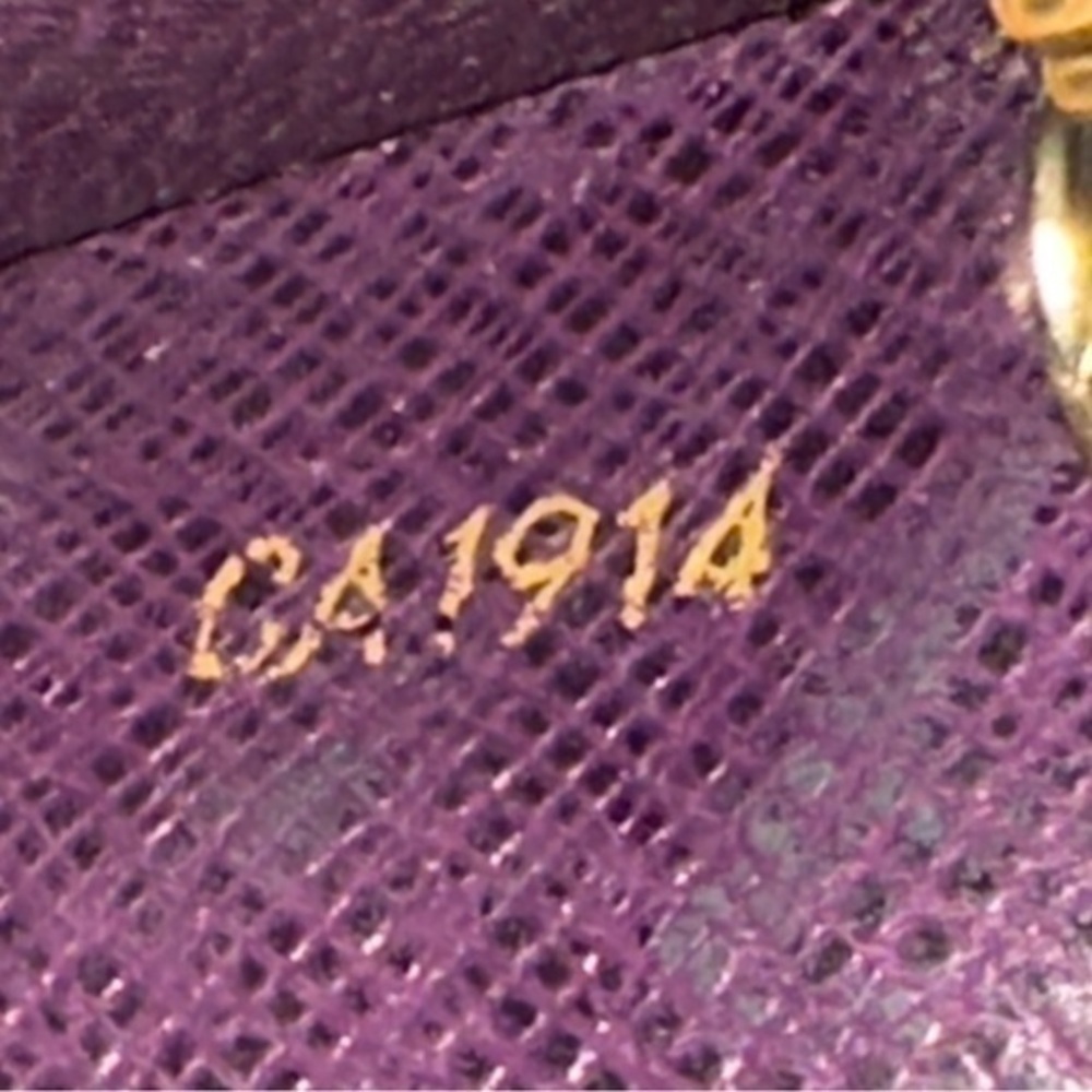 AUTHENTIC Louis Vuitton Epi Porte Tresor International wallet. Tassel yellow. - Picture 11 of 11